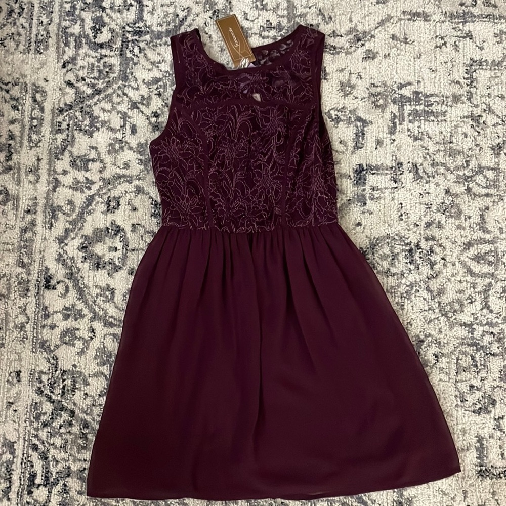 Francesca’s dark purple dress size: SM New with tag